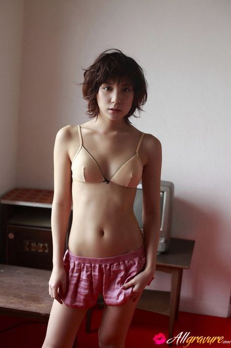Miu Nakamura shows off her tiny tits in a pink bra and panties